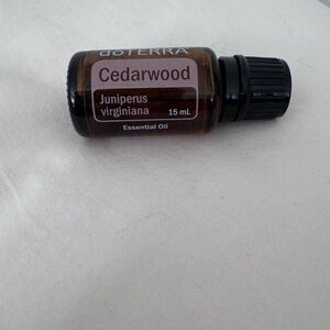 doTERRA Cedarwood Essential Oil in Brown and Black